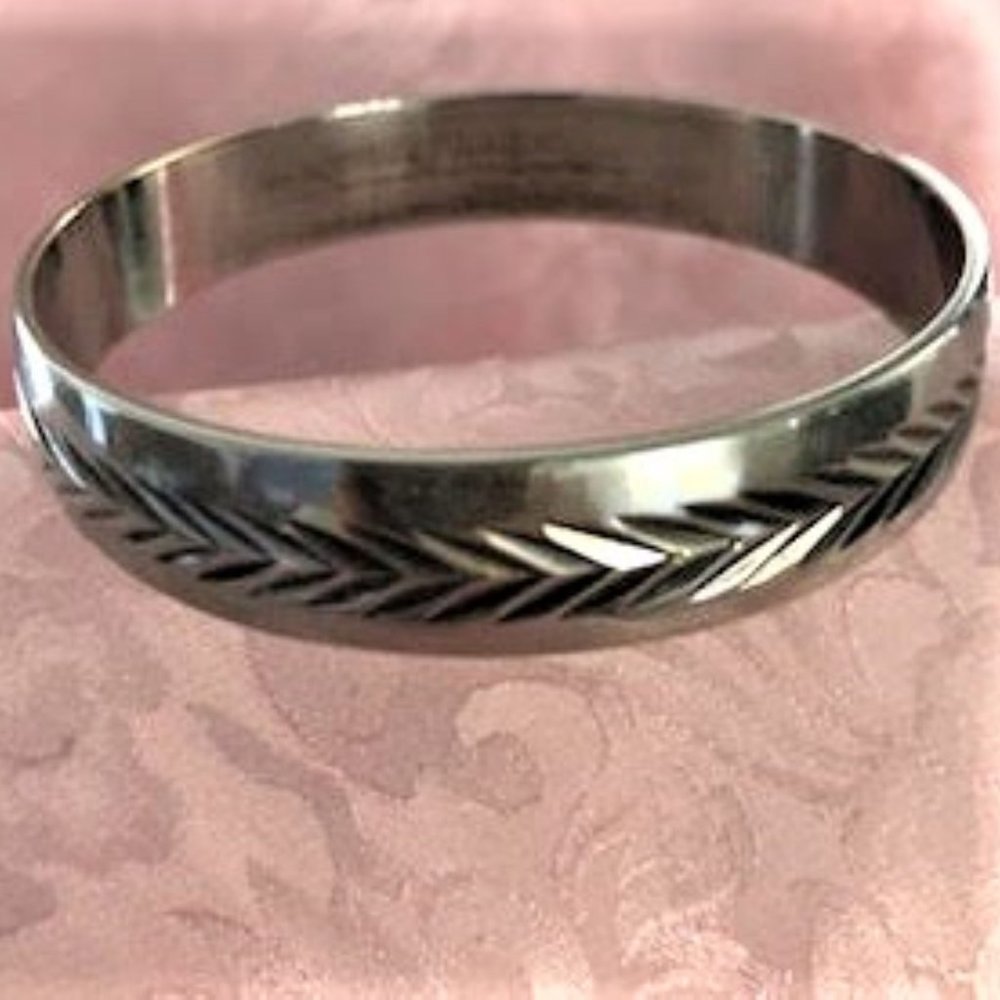 Silver Tone Bangle Bracelet with Geometric Design
